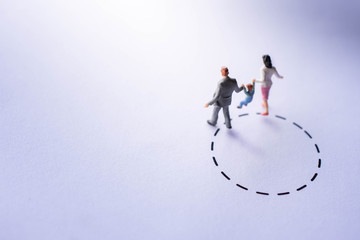 Comfort Zone for Kids Concept. present by Miniature Figure Happy Family Walking outside a Bound....