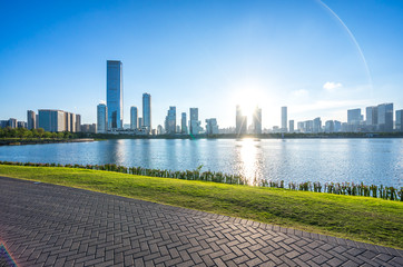 park with city skyline in urban