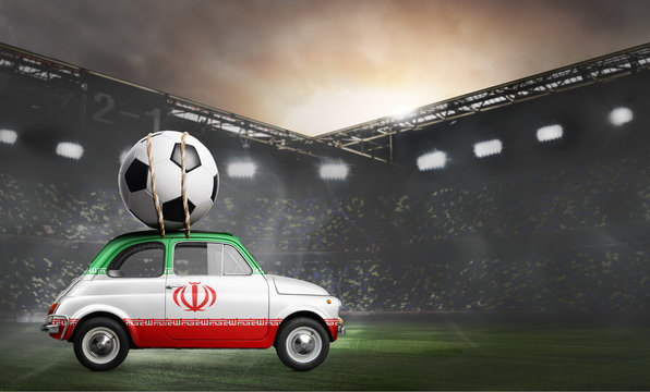 Iran flag on car delivering soccer or football ball at stadium