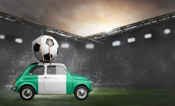 Nigeria flag on car delivering soccer or football ball at stadium