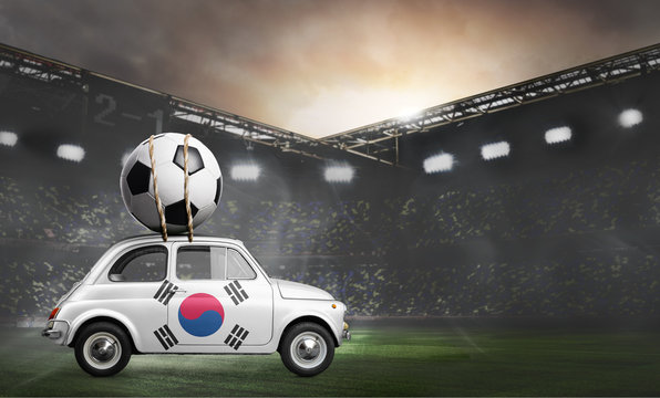 Korea flag on car delivering soccer or football ball at stadium