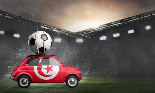 Tunisia flag on car delivering soccer or football ball at stadium