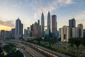 Naklejka na ściany i meble Majestic sunrise over downtown Kuala Lumpur, Malaysia