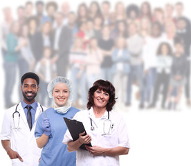 People in the foreground and a group of people in the background