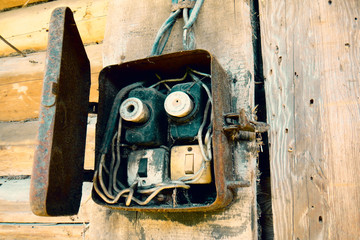 Old electric power supply boxes. Industrial background. Overloaded electrical circuit causing fuse to break. Electricity short circuit, Electrical failure resulting in electricity wire burnt