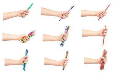 set of different Kid hand hold color felt pens and pencils with hand, isolated on white background