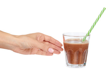 Glass of chocolate milk cocoa and straw with hand isolated on white background