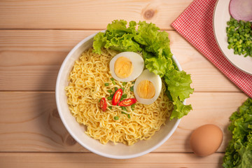 Asian noodles with vegetables and boiled egg