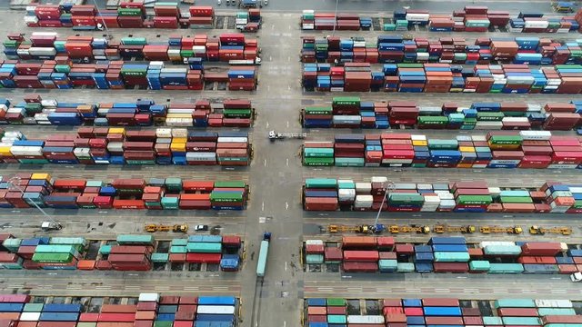 Aerial view of industrial port with containers, Shipping cargo to harbor. 4K