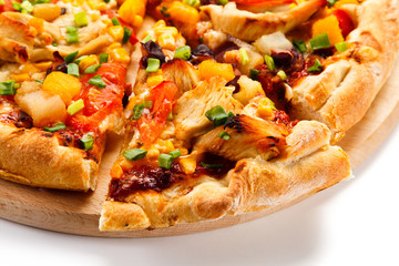 Pizza with chicken and vegetables on white background