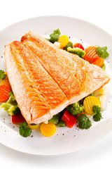 Roasted salmon steak and vegetables