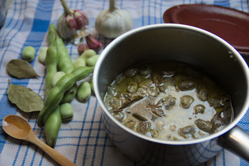 Cooked beans prepared together with some of their raw ingredients