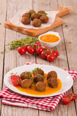 Meatballs with carrot purée.