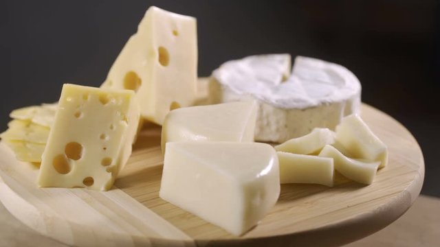 Pieces of different cheeses on plate