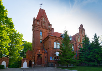 Fototapeta na wymiar Olecko; Poland - May 20, 2018: Built in1897 neo-gothic building of the poviat starosty.