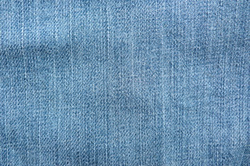 Naklejka premium denim blue fabric close-up blue jeans natural material background 