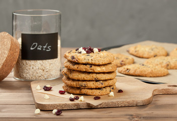 Fototapeta na wymiar Home Baked Oatmeal Cookies With White Chocolate And Cranberries.