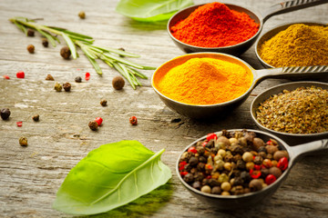 Wooden table of colorful spices.