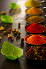 Wooden table of colorful spices.