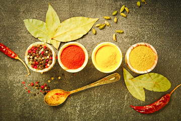 Wooden table of colorful spices.