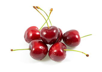 Obraz na płótnie Canvas Ripe fresh red cherry, Sweet cherries with drop of water isolated on the white background.