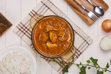 Delicious curry homemade, with little spicy peppers and fresh herbs!
