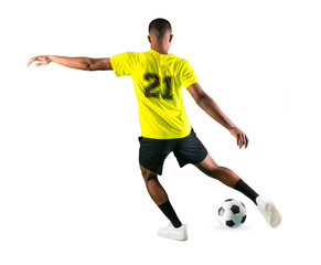 Fototapeta na wymiar Soccer player man with dark skinned playing kicking the ball