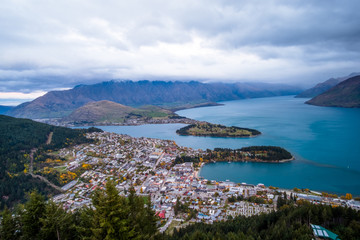 Landscape photography of Queenstown city during sunset time with cloudy scene.