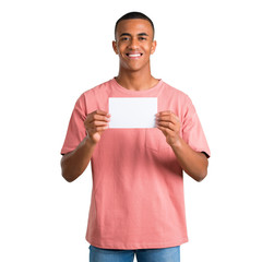 Young african american man holding an empty white placard for insert a concept on isolated white...