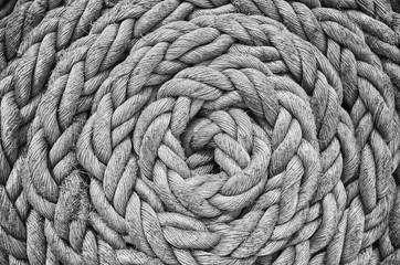 Black and white close up picture of an old sailing ship rope.