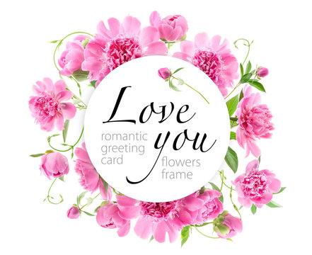 Beautiful pink peonies on white background. Top view. Romantic greeting card. Copy space
