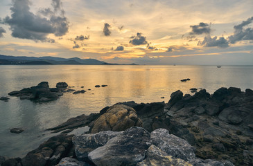 Colourful sunset over sea lagoon on a tropical island