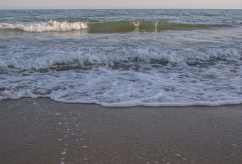 Beautiful view and waves on the beach in Varna, the sea capital of Bulgaria. What's better than sunny weather, sea and sight, waves and a nice company.
