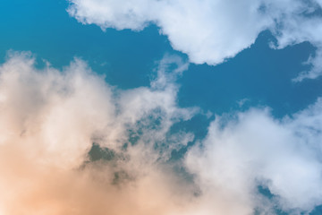 Sky with white clouds. Toned