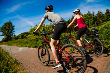 Fototapeta premium Healthy lifestyle - people riding bicycles