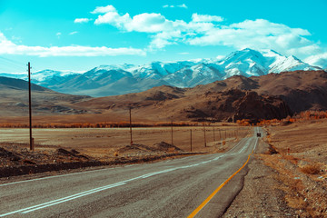 Landscape with beautiful empty mountain road. Travel background. Highway at mountains.