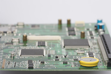 Electronic components are mounted on the device board Chips diodes capacitors chokes Close-up