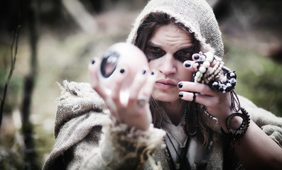 Fairy magician. A sorcerer with a glass sphere, a magical spell 