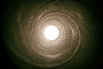 concept image of seeing the Light at the End of the Tunnel. sci fi or mystery , vintage tones