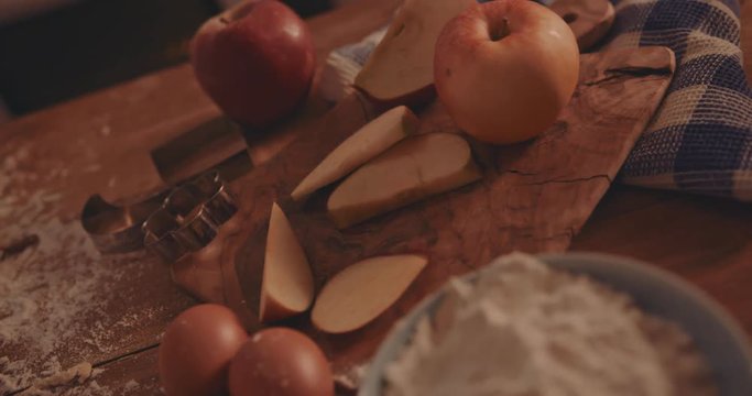 Ingredients and kitchen tools for apple pie baking