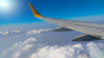 Beautiful view the wing of an airplane in the afternoon.