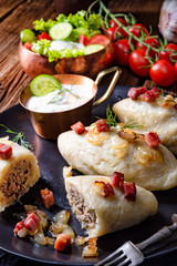 Rustic Cepelinai, a specialty Lithuanian and Polish cuisine.