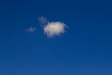 white clouds against a blue sky