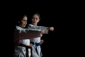 Children are training karate blows