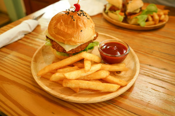 hamburger and chip tomato ketchup dip on wood table