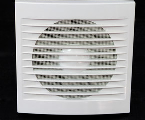 Wall electric extractor fan for bathroom. Closeup