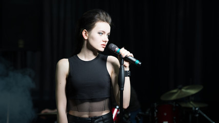 Fototapeta na wymiar girl rock singer concert