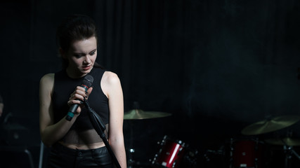 Fototapeta na wymiar girl rock singer concert