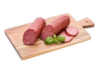 Salami smoked sausage, basil leaves on white background cutout.