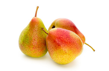 Fresh bio pear with leaves on isolated white background.